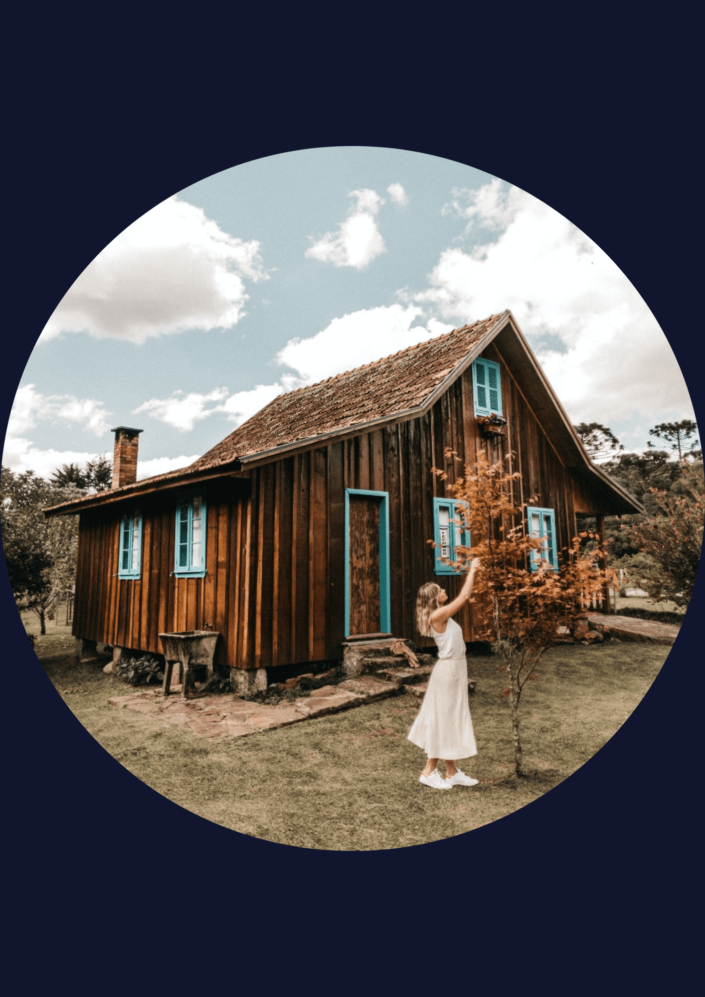 A woman enjoing her holidays in a charming rustic cabin made by wood during autumn time